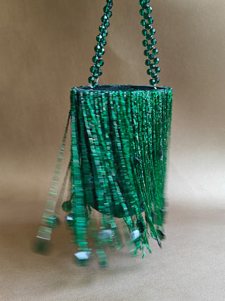 Green embellished potli with tassels and sparkle