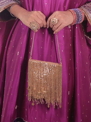 Gold embellished potli bag with swaying tassels
