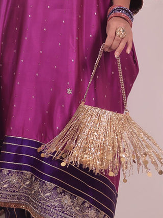 Gold embellished potli bag with swaying tassels