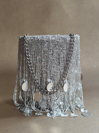 Silver embellished potli with tassels and sparkle