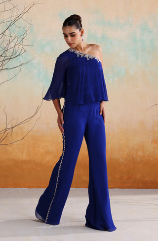Electric blue one-shoulder embellished top with flared pants
