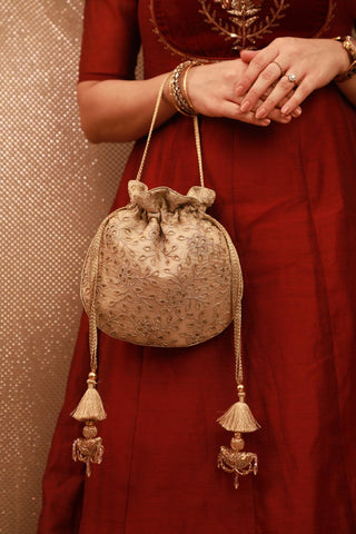 Gold tarang cutwork potli