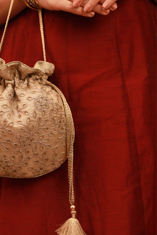 Gold tarang cutwork potli