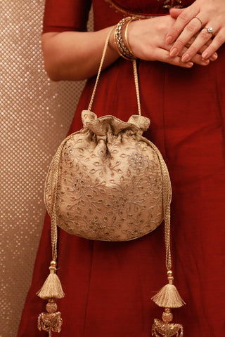 Gold tarang cutwork potli