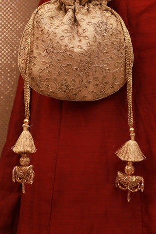 Gold tarang cutwork potli