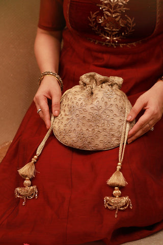 Gold tarang cutwork potli