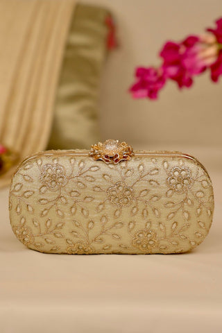 Light gold tarang cutwork capsule clutch