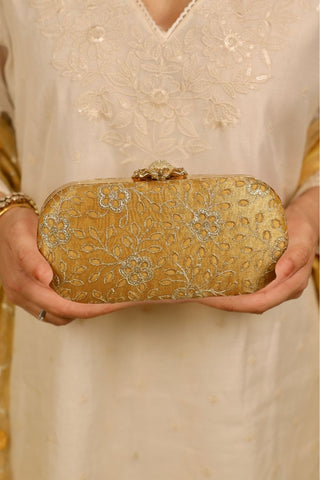 Yellow tarang cutwork capsule clutch