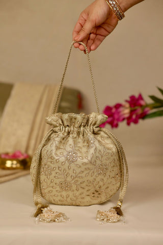 Light gold tarang cutwork potli