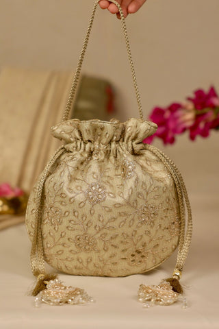 Light gold tarang cutwork potli