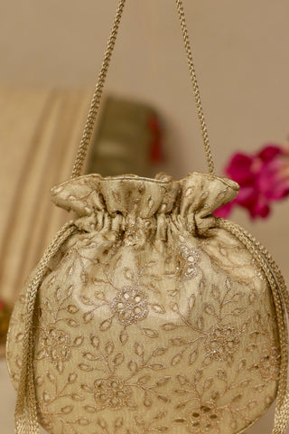 Light gold tarang cutwork potli