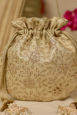 Light gold tarang cutwork potli