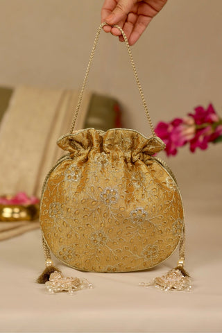 Yellow tarang cutwork potli