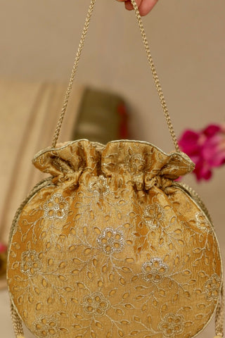 Yellow tarang cutwork potli