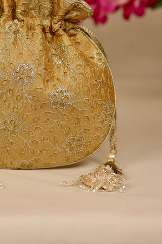 Yellow tarang cutwork potli