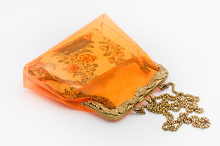 Rust orange vinyl potli clutch