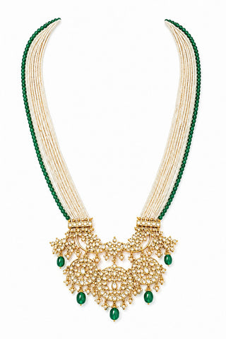 Flat product view of the white pearl strand necklace with green bead drops and kundan pendant showing ornate kundan-style pendant with green bead drops at Mrs. G
