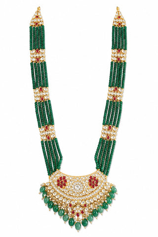 Flat product view of the emerald green beaded kundan statement necklace with ruby accents showing statement pendant with ruby accents at Mrs. G