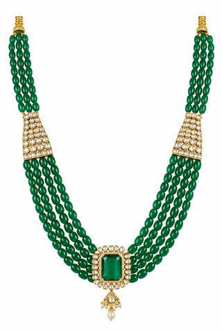 Flat product view of the emerald green kundan beaded pendant groom necklace showing rectangular green centerpiece with teardrop drop at Mrs. G
