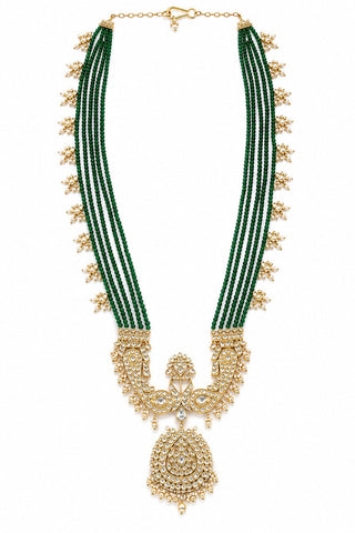 Flat product view of the emerald green beaded kundan pendant groom necklace showing ornate gold-plated statement pendant at Mrs. G