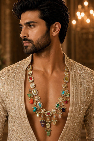 On-model view of the multicolor gemstone-drop kundan statement necklace by Vivinia by Vidhi Mehra worn with a beige embroidered kurta at Mrs. G