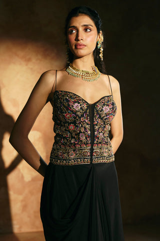 Close-up front view of the black corset set with sweetheart neckline and slim shoulder straps by Aman Takyar at Mrs. G