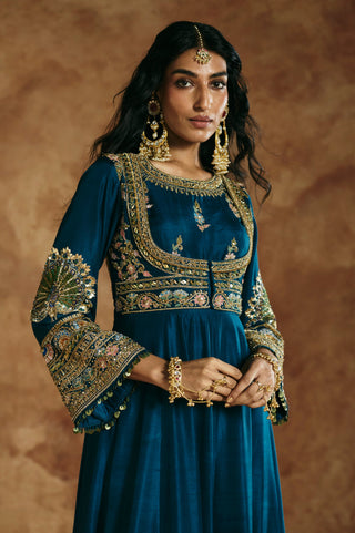 Waist-up view of the teal blue anarkali with the embroidered jacket-style bodice by Aman Takyar at Mrs. G