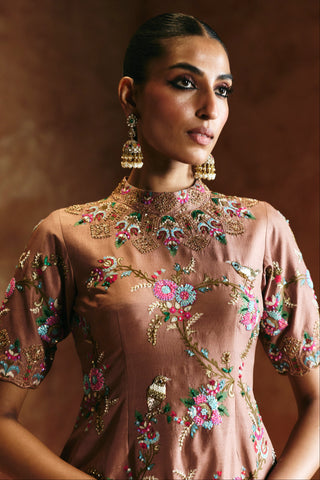 Close-up of the bronze sharara set high neckline and half sleeves with floral embroidery by Aman Takyar at Mrs. G