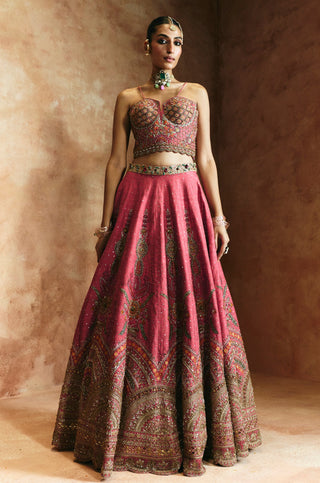 Full-length front view of the carrot pink lehenga and blouse without the dupatta by Aman Takyar at Mrs. G