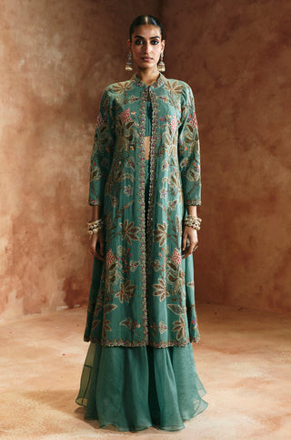Full-length front view of the buttoned coral blue jacket over the flared skirt by Aman Takyar at Mrs. G