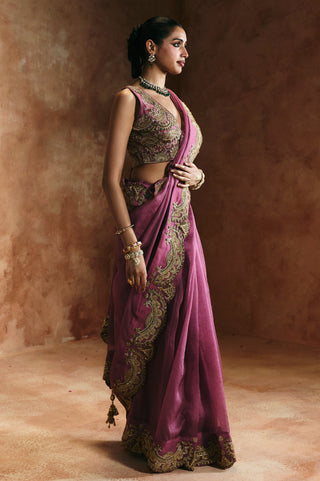 Side profile of the peach saree showing the border down the drape and the tasseled pallu corner by Aman Takyar at Mrs. G