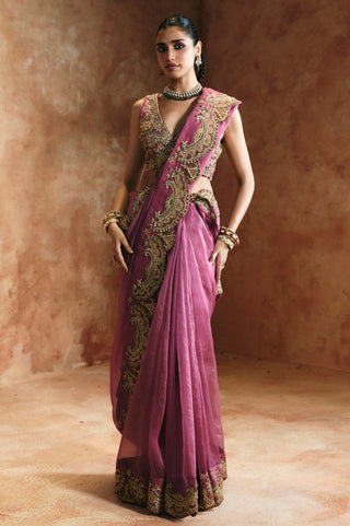 Full-length three-quarter view of the peach saree with the scalloped gold hem by Aman Takyar at Mrs. G