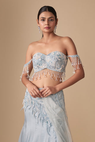Waist-up view of the beaded bustier with crystal fringe and the paisley embroidered skirt yoke by Asaga at Mrs. G