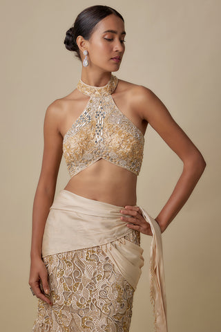 Close-up of the mirror and gold floral halter panel and the satin wrap at the hip by Asaga at Mrs. G