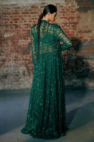 Back view of the emerald green long sheer jacket with flowing embroidery and a braid by Asaga at Mrs. G