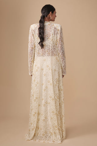 Full-length back view of the floor-length leaf cutwork net jacket with gold sequin flowers by Asaga at Mrs. G