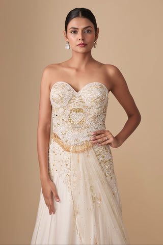 Close-up of the strapless sweetheart corset with heart motif embroidery and tassel hem by Asaga at Mrs. G