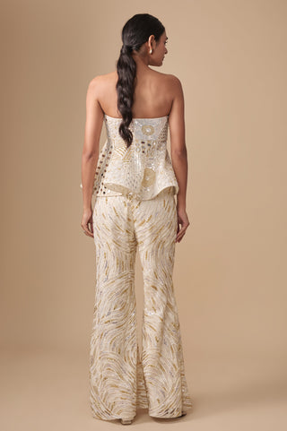 Full-length back view of the ivory gold peplum top with mirror panels and the sequin sharara by Asaga at Mrs. G