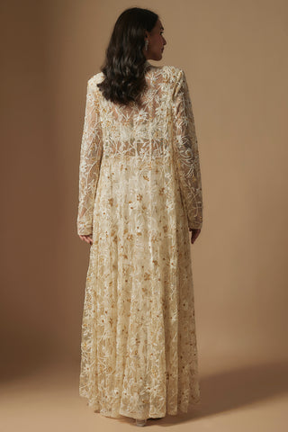 Back view of ivory floor-length sheer jacket embroidered in trailing flowers by Asaga at Mrs. G