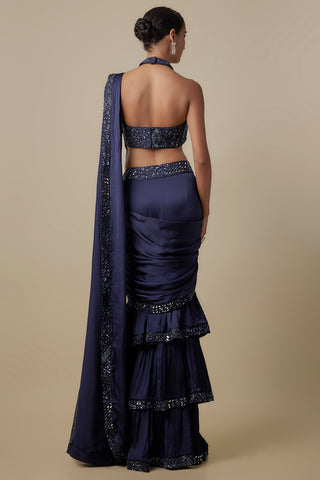 Full-length back view of the navy halter blouse and tiered ruffle skirt with mirror borders by Asaga at Mrs. G