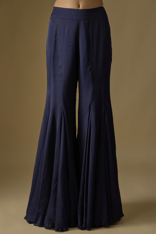 Close-up of the navy blue satin sharara with godet panels by Asaga at Mrs. G