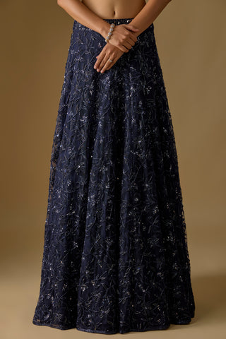 Skirt detail of the navy lehenga's floral vine sequin embroidery and wide flare, shown without the blouse by Asaga at Mrs. G