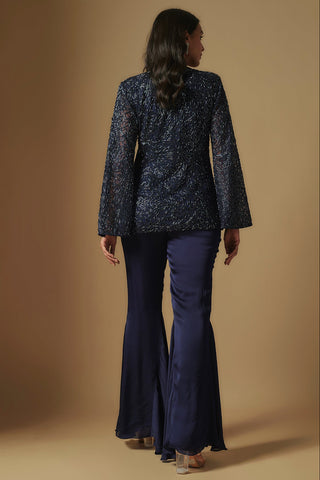 Back view of navy beaded cape-style kurti with sheer sleeves and flared sharara by Asaga at Mrs. G