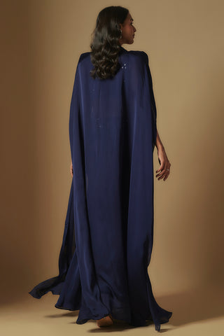 Back view of navy sheer cape with structured shoulders trailing to the floor by Asaga at Mrs. G