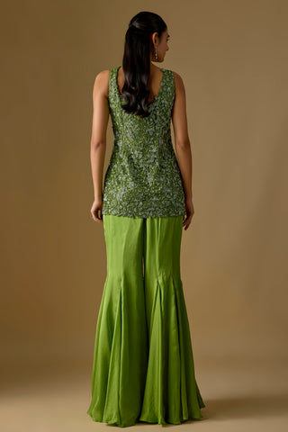 Back view of the olive green sleeveless kurti and flared sharara by Asaga at Mrs. G