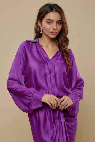 Back view of the purple satin dress with a hand embroidered collar and a draped skirt by Asaga at Mrs. G