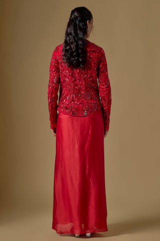 Back view of the red embroidered jacket over the smooth satin organza skirt by Asaga at Mrs. G