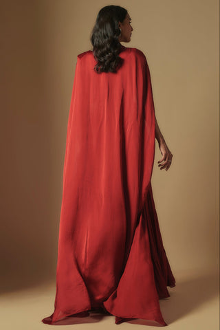 Back view of red satin cape with structured shoulders falling to the floor by Asaga at Mrs. G