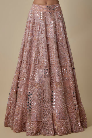 Close-up of the rose gold lehenga skirt in mirror, sequin and floral patchwork panels by Asaga at Mrs. G