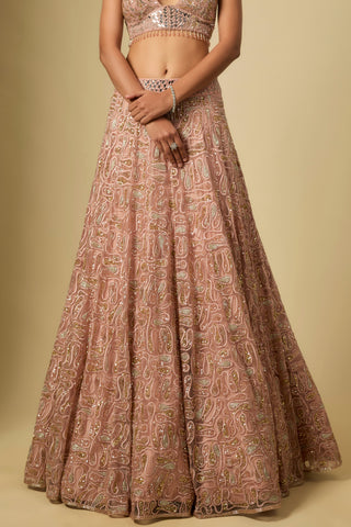 Close-up of the rose gold paisley embroidered lehenga skirt with a fitted waistband by Asaga at Mrs. G